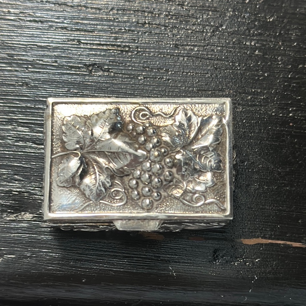 Antique silver stamp or pillbox. Grapes, leaves and roses on pattern. EUC